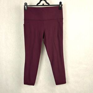 Athleta Salutation Stash 7/8 Tight Leggings Womens Sz Med Burgundy High Rise Poc